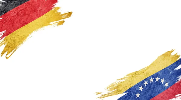 白色背景下的德国和委内瑞拉国旗 — 图库照片